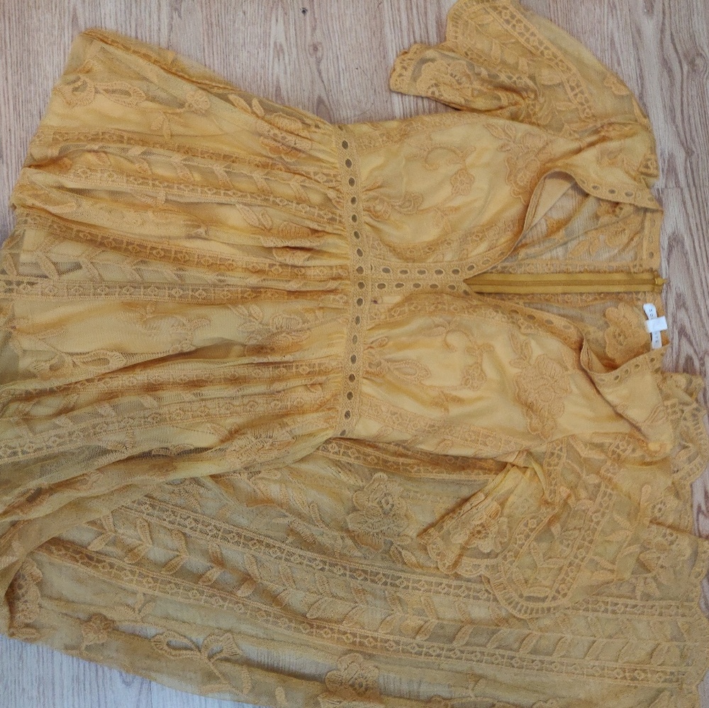 Long yellow romper with skirt